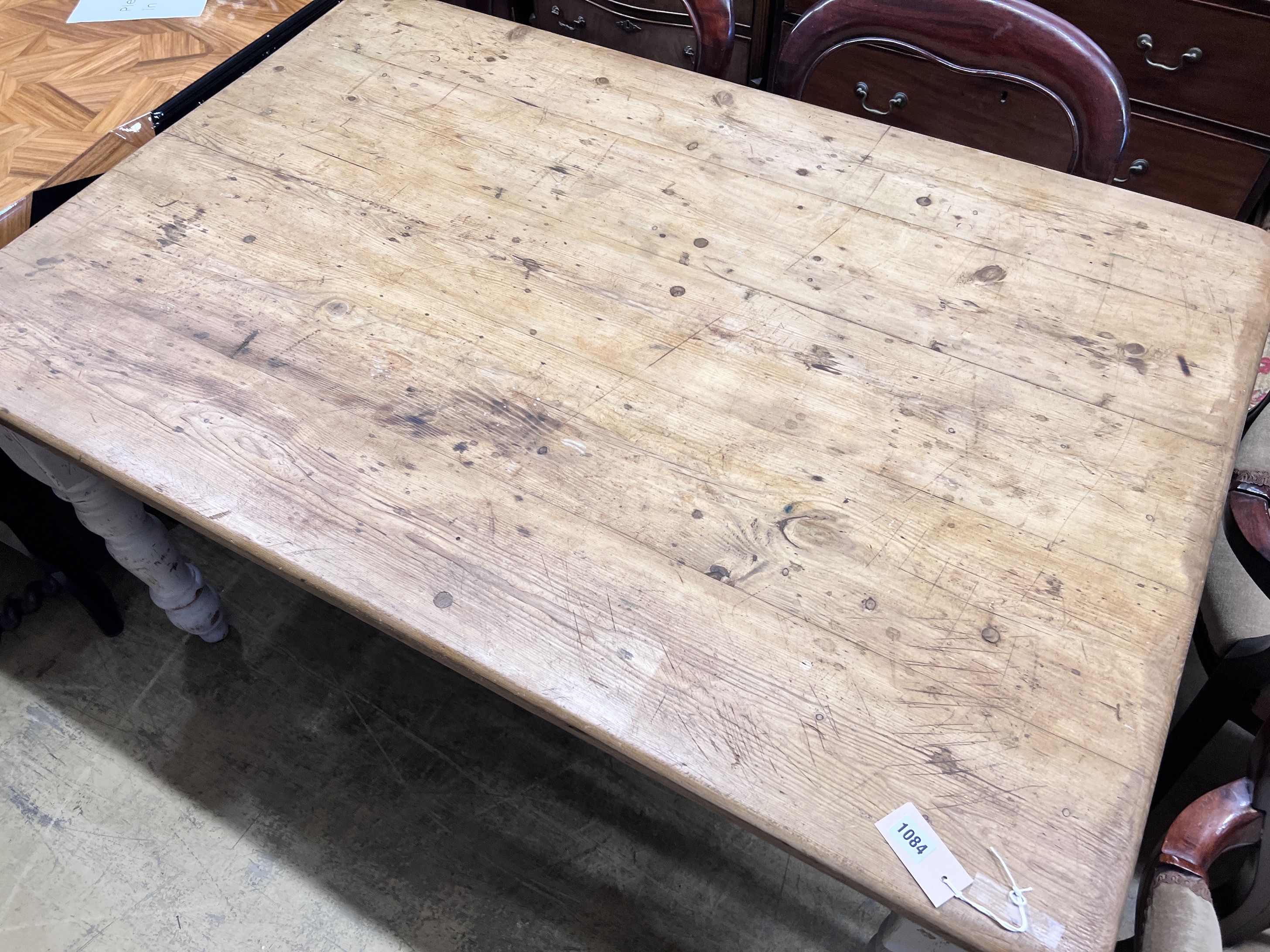 A Victorian style pine kitchen table with painted underframe, width 137cm, height 92cm